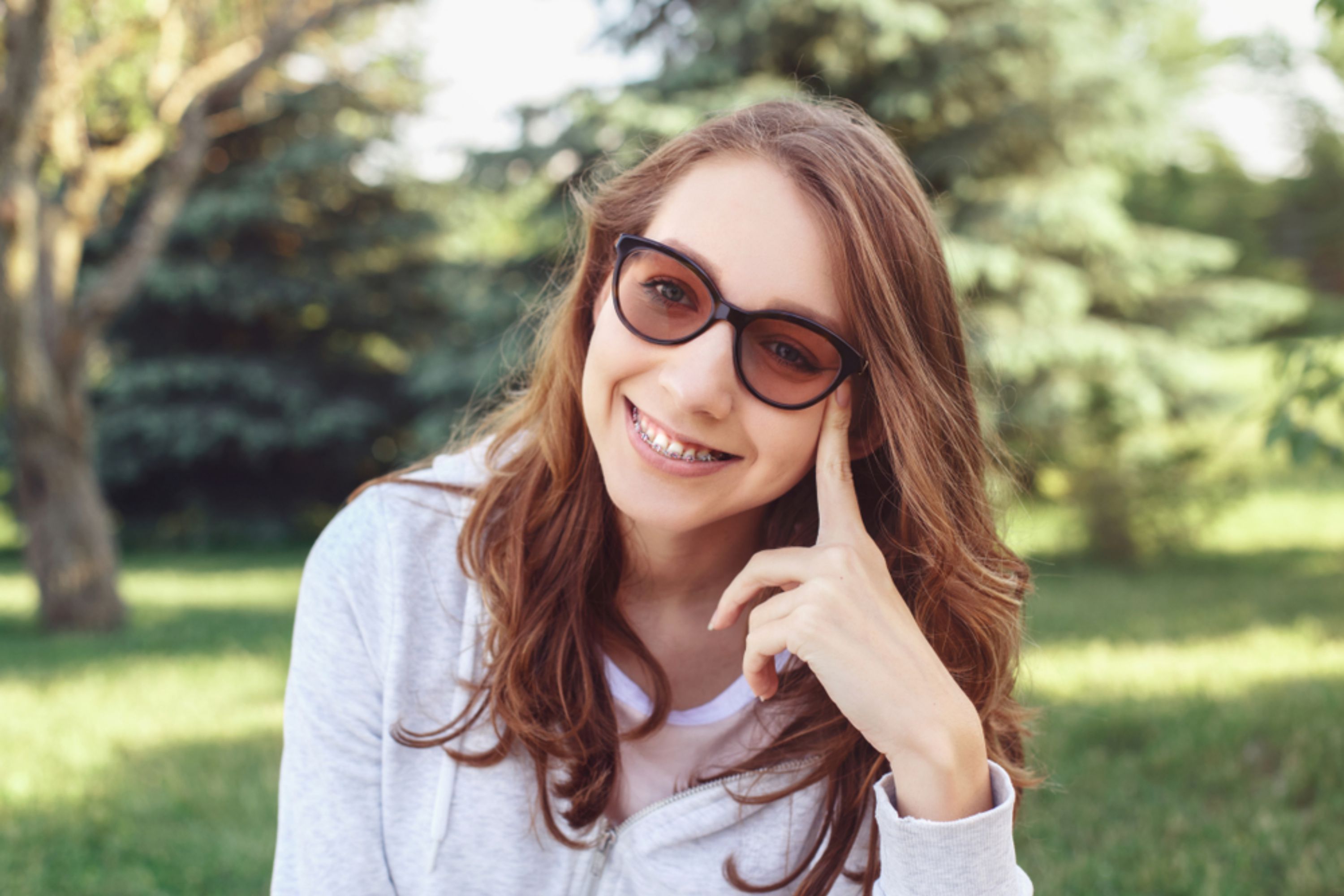 girl-with-braces-smiling-looking-at-camera