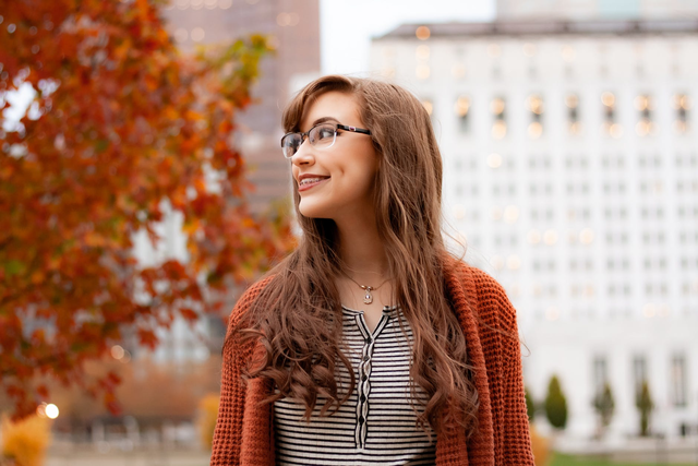 Smiling girl in the autumn