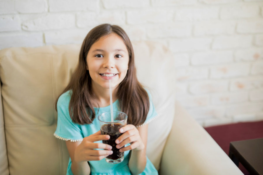 girl-drinks-soda-with-braces